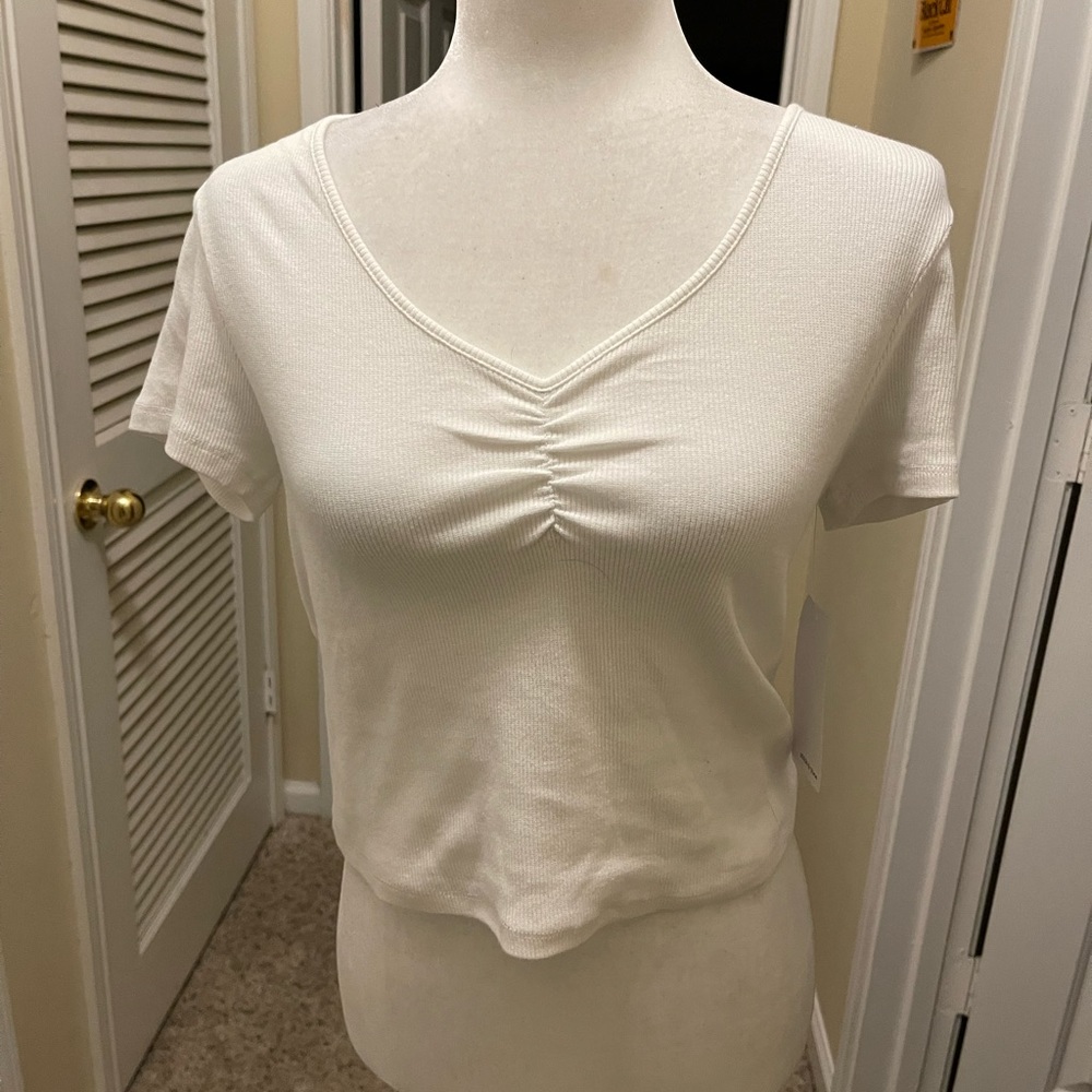 Fred Meyer cute white crop top with lace up back. Size L but fits like M.